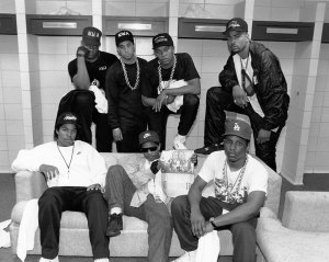 Rap group N.W.A. pose with rappers The D.O.C. and Laylaw from Above The Law (L-R standing: Laylaw, DJ Yella, Dr. Dre and The D.O.C. seated Ice Cube, Eazy-E and MC Ren)backstage at the Kemper Arena during their 'Straight Outta Compton' tour in June 1989 in Kansas City, Mo.